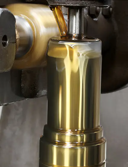 Close-up view of Titanium Nitride (TiN) coating being applied to industrial tools, enhancing hardness, reducing friction, and protecting against wear and heat.