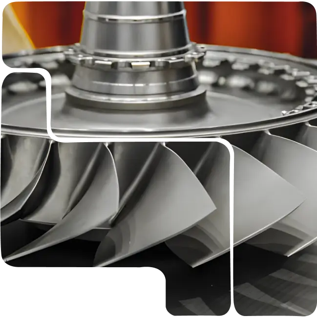 A close-up of a jet engine component's fan blades and central rotor, illustrating the precision and extreme durability provided by PVD coating services for aerospace components.